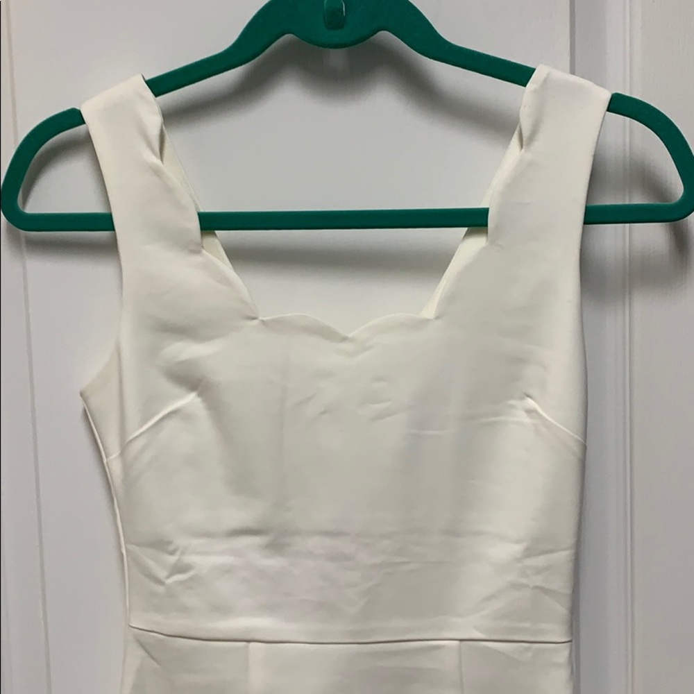 Cream bodycon shift dress.